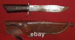 1983 Hand Made steel hunting bowie knife with leather sheath