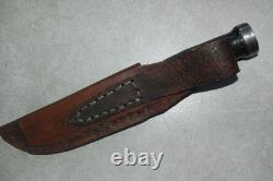 Cattaraugus 225Q knife. Hand-sewn and decorated leather sheath