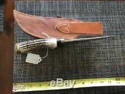 Clyde Fischer custom knife Texas Hunter model in Johnson roughback sheath