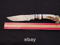 Incredible Jennings custom made hunting knife. Crown Stag. Raindrop Damascus