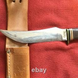 KA-BAR Knife with sheath. Sheath has deer engraved. Knife 9 1/4 blade 5