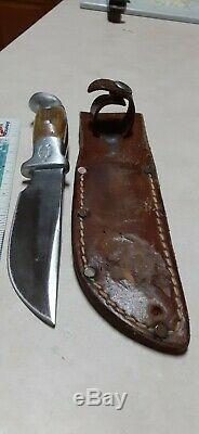 R. H. Ruana M Stamp skinnnings knife with original sheathe, antler/stag handlr