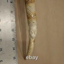 Unbranded hunting knife with custom carved handle bone/antler